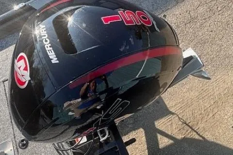 Slide: The Image of 2026 Tracker Pro Team 195 boat with Mercury 150 engine, outdoor setting. - 15