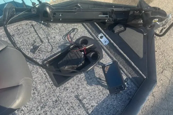 Slide: The Image of 2026 Tracker Pro Team 195 boat deck with fishing equipment and electronics. - 3