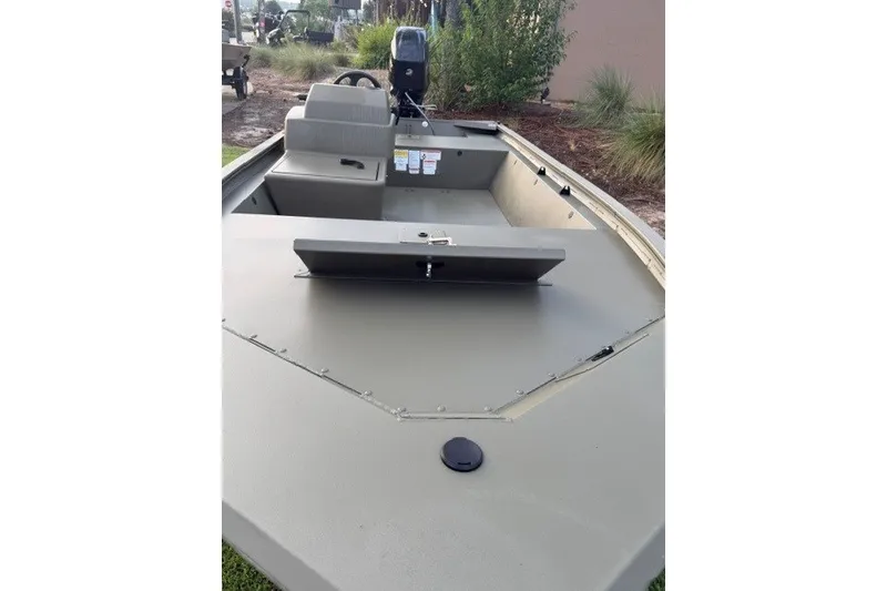 Slide: The Image of 2026 Tracker Grizzly 1648 SC boat, featuring spacious interior and durable design. - 9
