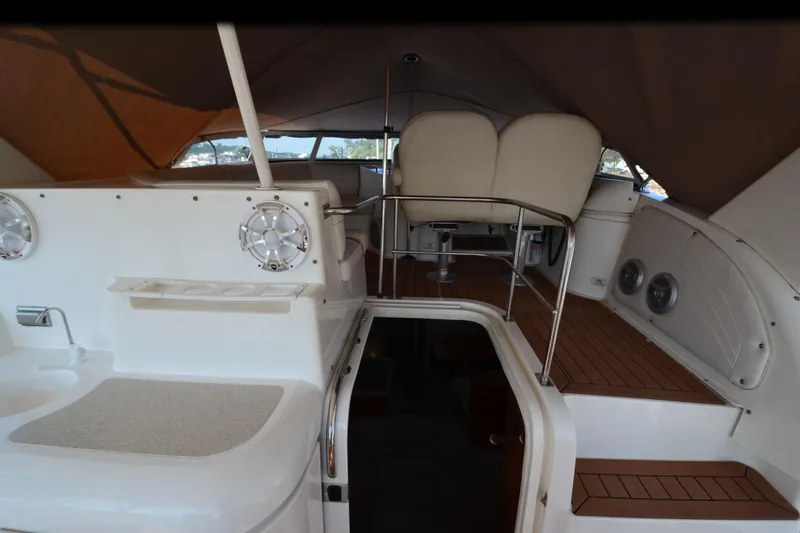 Slide: The Image of 2001 Cruisers Yachts 3750 Motoryacht interior with seating and helm area. - 14
