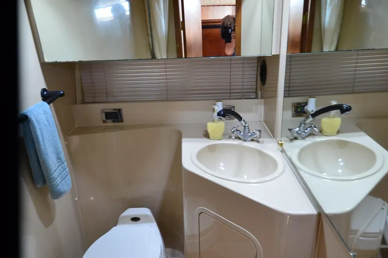 Slide: The Image of Bathroom interior of 2001 Cruisers Yachts 3750 Motoryacht with sink and mirror. - 29