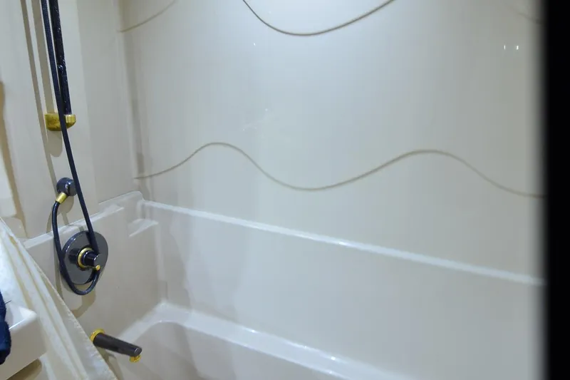 Slide: The Image of Shower area in 2001 Cruisers Yachts 3750 Motoryacht with modern fixtures. - 36