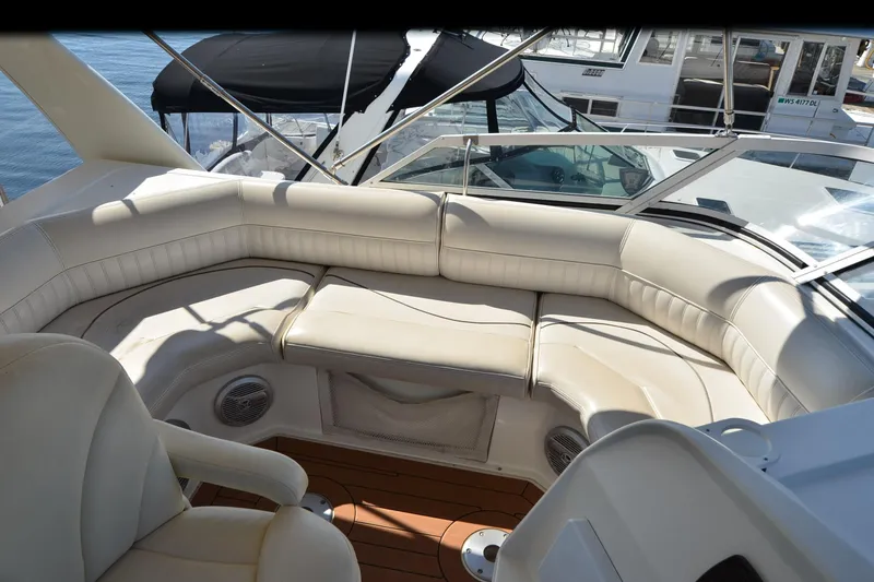 Slide: The Image of Luxurious seating area on 2001 Cruisers Yachts 3750 Motoryacht, featuring plush white upholstery. - 44