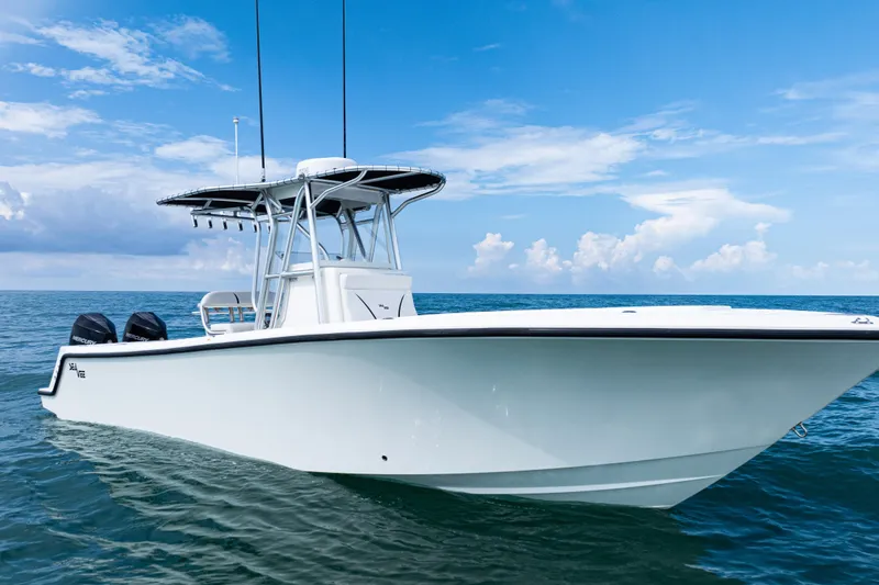 Slide: The Image of 2018 SeaVee 29 boat on open water under a clear sky. - 3