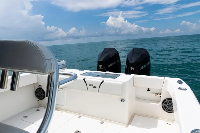 Slide: The Image of 2018 SeaVee 29 boat with dual Mercury engines on open ocean. - 34