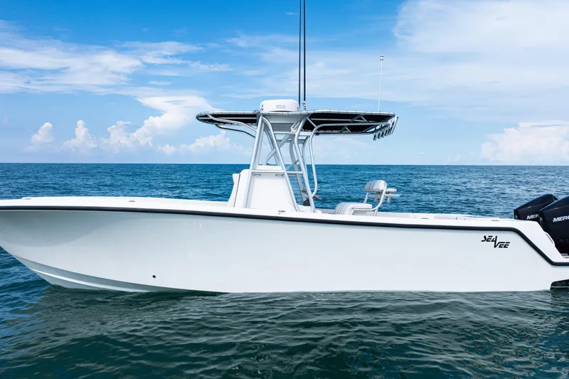 Slide: The Image of 2018 SeaVee 29 boat on open ocean under clear blue sky. - 49