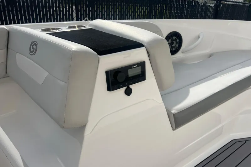 Slide: The Image of 2022 Hurricane SunDeck Sport 185 OB boat interior with seating and audio system. - 10