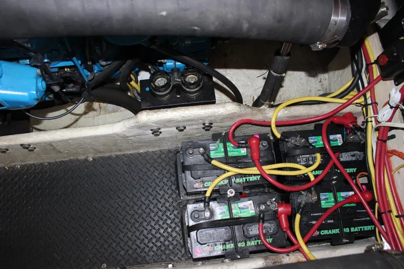 Slide: The Image of Engine compartment of a 2007 Silverton 36 Convertible with batteries and wiring. - 44
