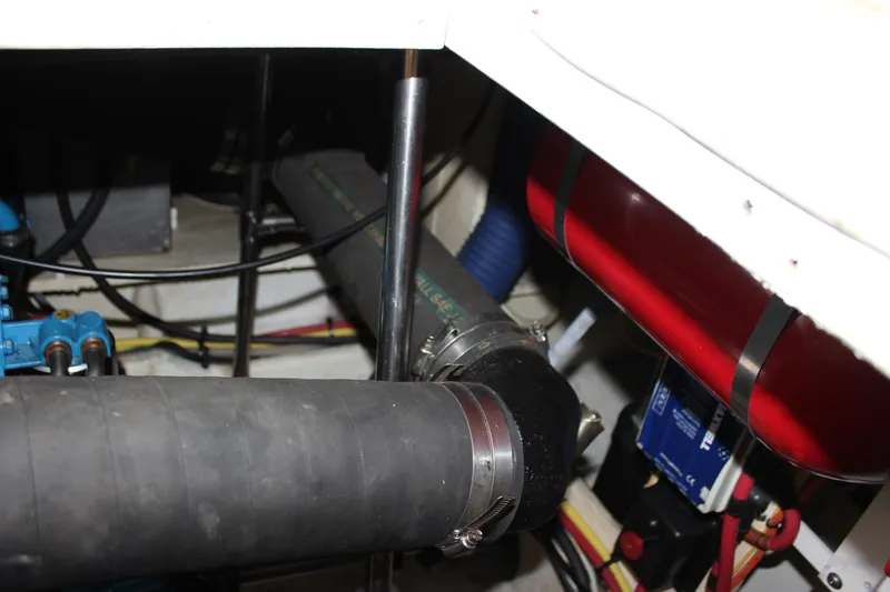 Slide: The Image of Engine compartment of 2007 Silverton 36 Convertible with hoses and wiring. - 46