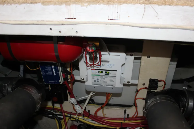 Slide: The Image of Engine room of 2007 Silverton 36 Convertible with electrical components and wiring. - 49