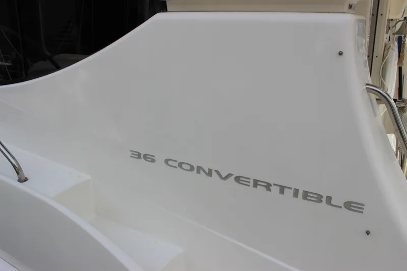 Slide: The Image of 2007 Silverton 36 Convertible yacht, white exterior with model name displayed. - 6
