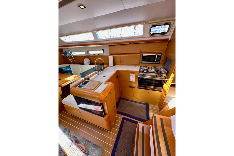Slide: The Image of Interior of 2015 Jeanneau Sun Odyssey 409 yacht kitchen with modern amenities. - 42
