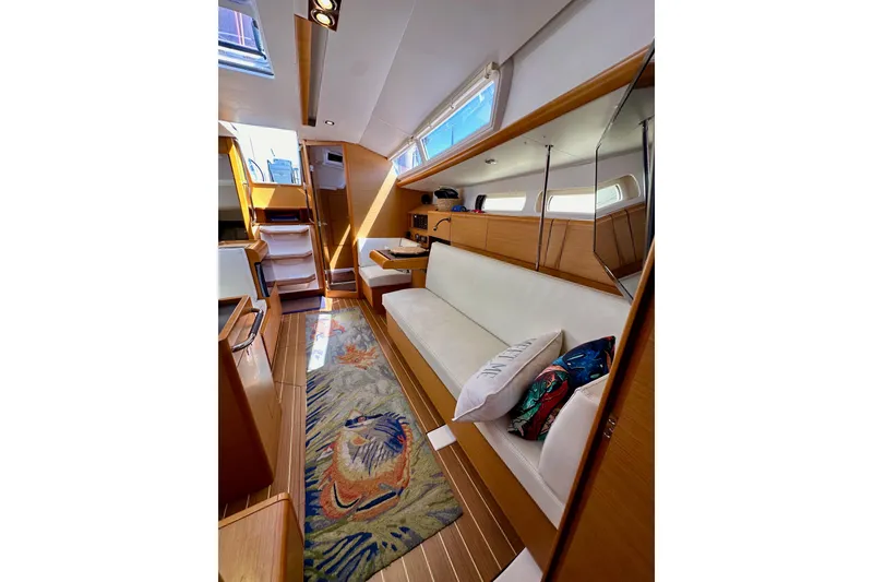 Slide: The Image of Bathroom interior of 2015 Jeanneau Sun Odyssey 409 yacht, featuring sink and toilet. - 67