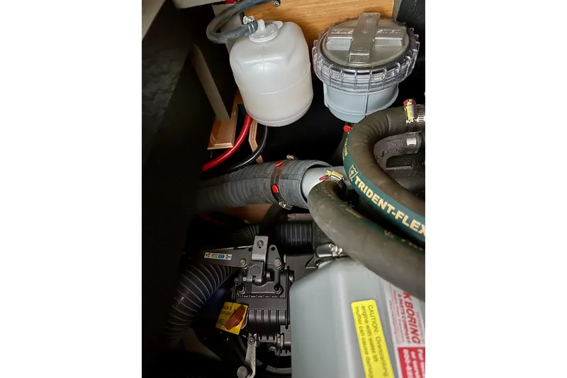 Slide: The Image of Engine compartment of 2015 Jeanneau Sun Odyssey 409 sailboat, featuring Yanmar engine. - 72