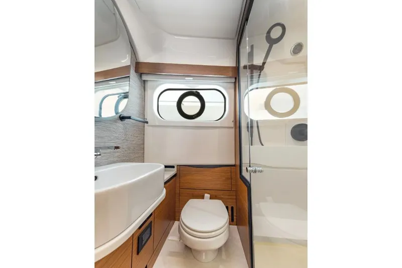 Slide: The Image of Modern bathroom in 2026 Tiara Yachts 39, featuring sleek design and wood accents. - 17