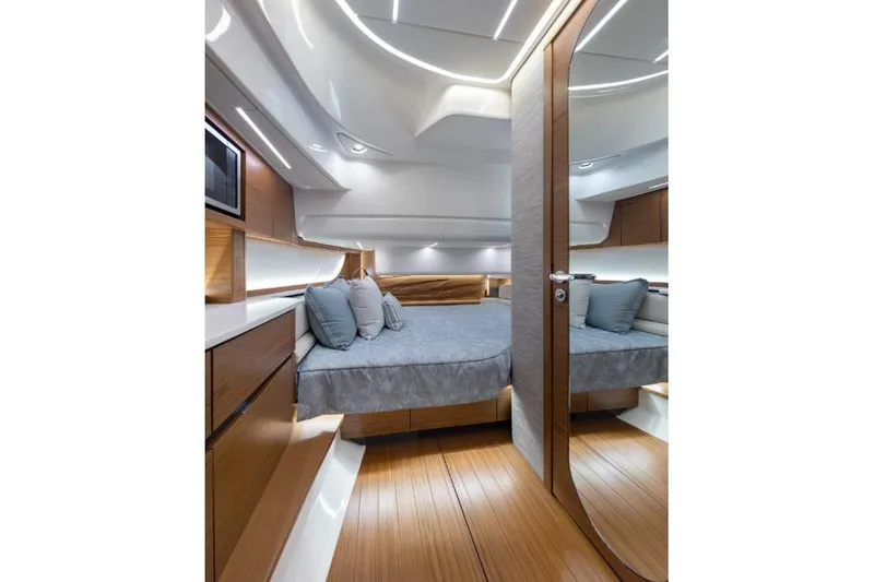 Slide: The Image of Luxurious interior of 2026 Tiara Yachts 39, featuring modern design and elegant wood finishes. - 23