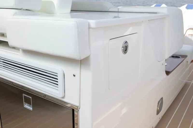 Slide: The Image of 2026 Tiara Yachts 39, sleek white exterior with modern design details. - 6