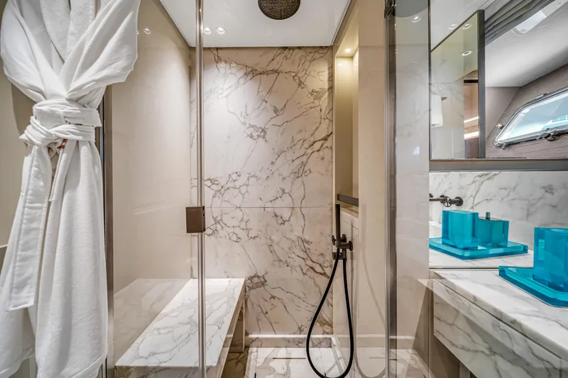 Slide: The Image of Luxurious marble bathroom in 2020 Sanlorenzo SX88 yacht, featuring modern fixtures and elegant design. - 100