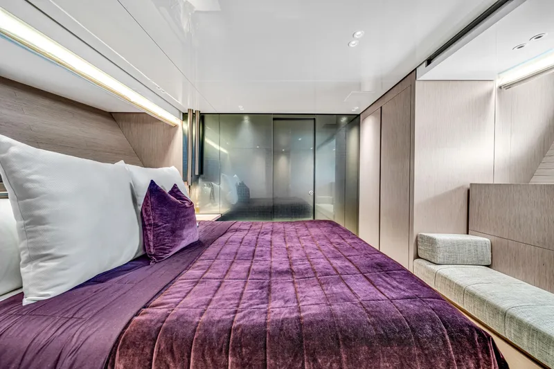 Slide: The Image of Luxurious bedroom interior on 2020 Sanlorenzo SX88 yacht with purple bedding and modern design. - 101