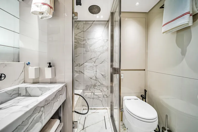 Slide: The Image of Luxurious bathroom in 2020 Sanlorenzo SX88 yacht with marble accents and modern fixtures. - 107