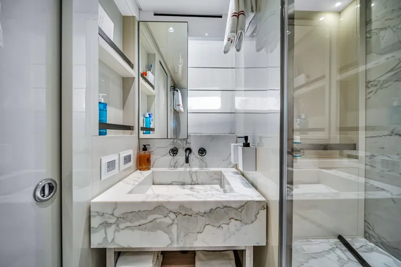 Slide: The Image of Luxurious marble bathroom in 2020 Sanlorenzo SX88 yacht, featuring modern fixtures and elegant design. - 108