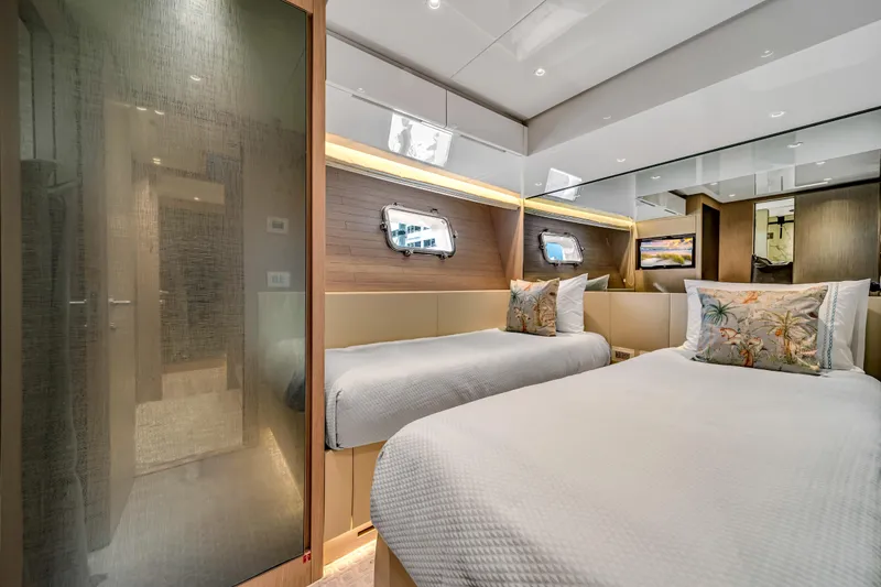Slide: The Image of Luxurious twin bedroom on 2020 Sanlorenzo SX88 yacht, featuring elegant decor and modern amenities. - 113