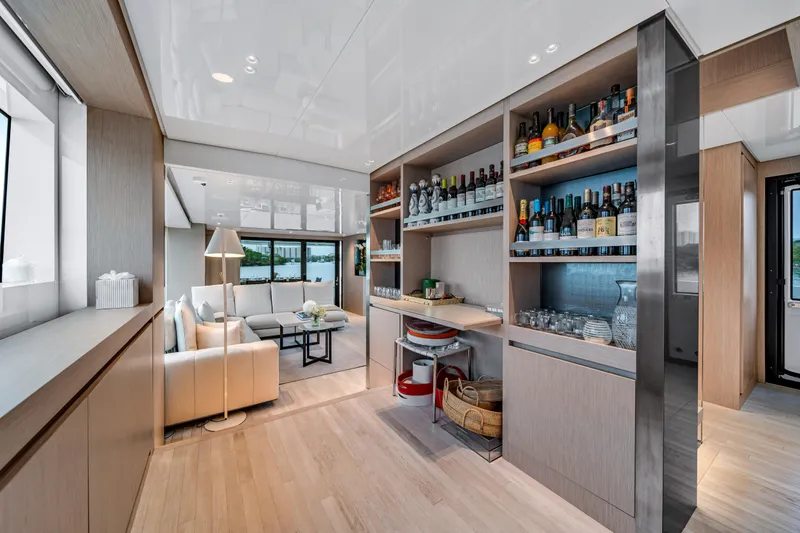 Slide: The Image of Luxurious interior of 2020 Sanlorenzo SX88 yacht with elegant lounge and well-stocked bar. - 2