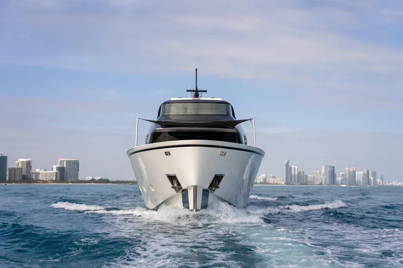 Slide: The Image of Sanlorenzo SX88 2020 yacht cruising near city skyline on a sunny day. - 29