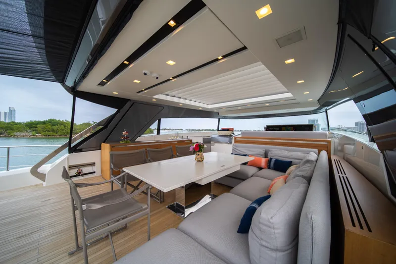 Slide: The Image of Luxurious 2020 Sanlorenzo SX88 yacht interior with modern seating and dining area. - 39