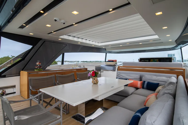Slide: The Image of Luxurious 2020 Sanlorenzo SX88 yacht interior with modern seating and dining area. - 40