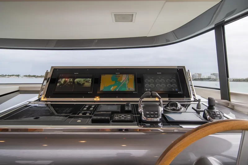 Slide: The Image of Control panel of 2020 Sanlorenzo SX88 yacht with navigation screens and controls. - 46