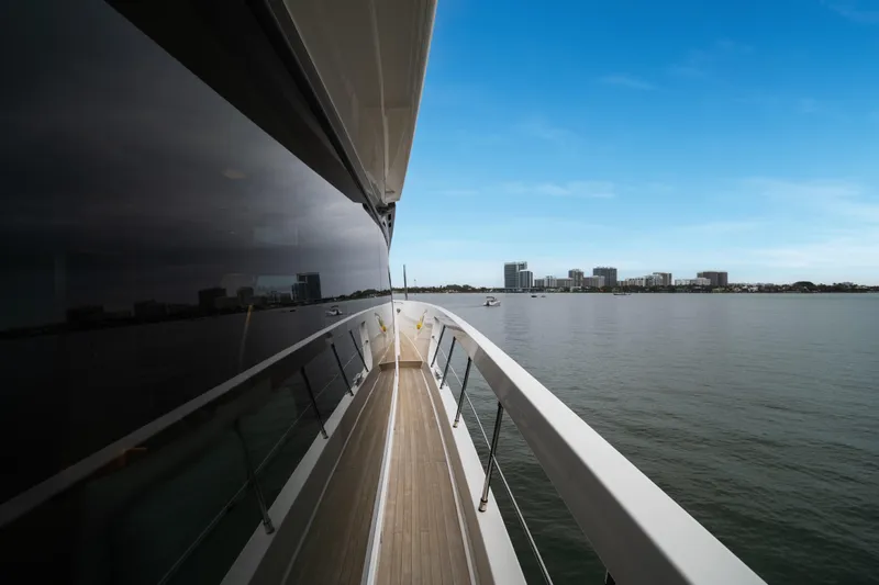 Slide: The Image of Sanlorenzo SX88 yacht deck view with city skyline, 2020 model. - 62