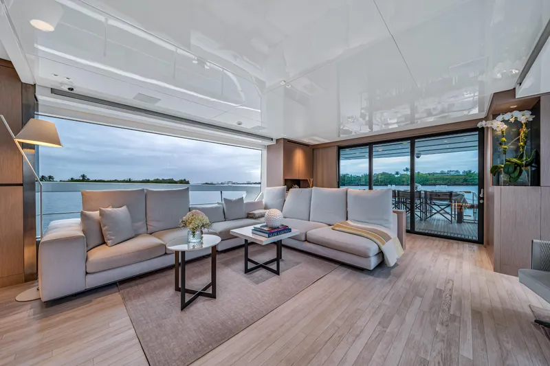 Slide: The Image of Luxurious 2020 Sanlorenzo SX88 yacht interior with elegant seating and ocean view. - 68