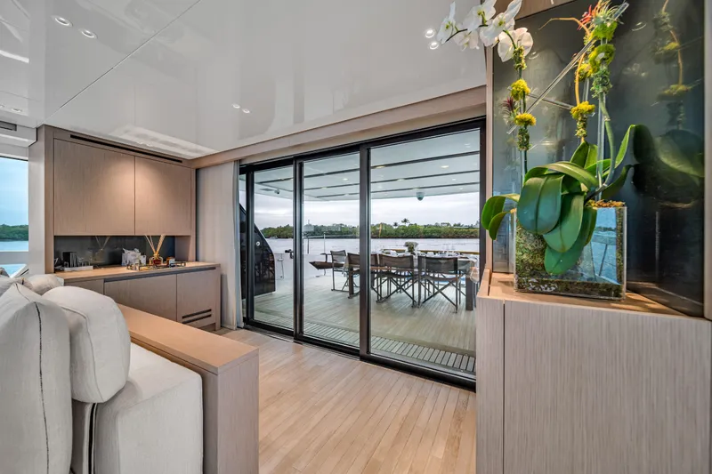 Slide: The Image of Luxurious interior of 2020 Sanlorenzo SX88 yacht with elegant decor and outdoor dining area. - 73