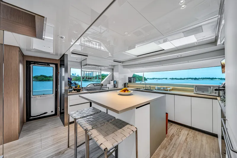 Slide: The Image of Luxurious 2020 Sanlorenzo SX88 yacht kitchen with modern design and scenic ocean view. - 76