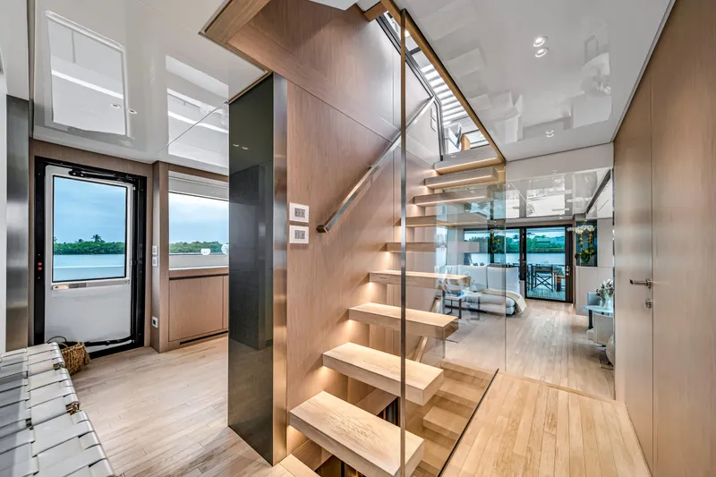 Slide: The Image of Luxurious interior of 2020 Sanlorenzo SX88 yacht with modern staircase and elegant design. - 77