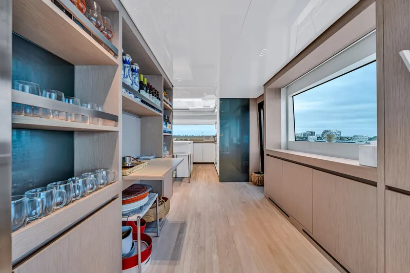 Slide: The Image of Luxurious interior of 2020 Sanlorenzo SX88 yacht with modern kitchen and panoramic window. - 79