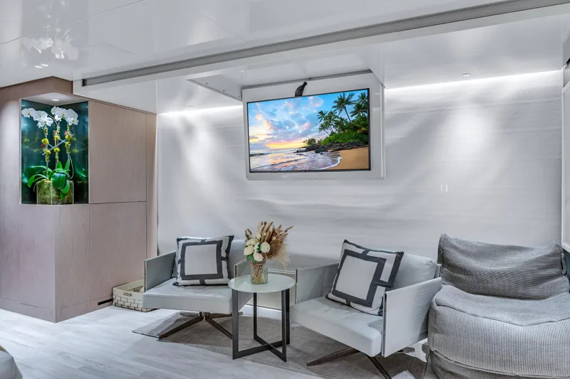 Slide: The Image of Luxurious Sanlorenzo SX88 yacht interior with modern seating, TV, and elegant decor, 2020 model. - 84