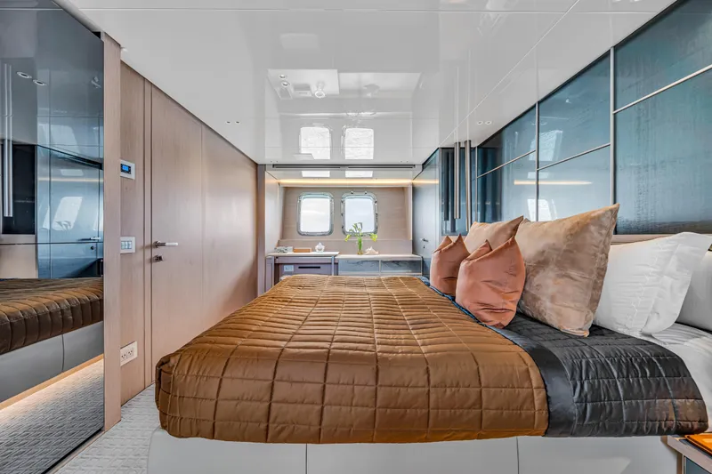 Slide: The Image of Luxurious Sanlorenzo SX88 2020 yacht bedroom with modern design and elegant decor. - 88
