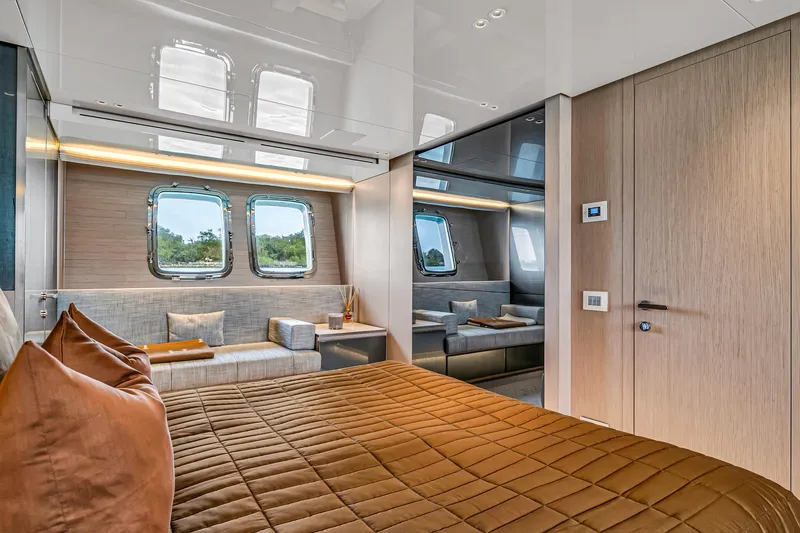 Slide: The Image of Luxurious Sanlorenzo SX88 2020 yacht interior with modern bedroom and scenic windows. - 91