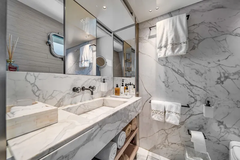 Slide: The Image of Luxurious marble bathroom in 2020 Sanlorenzo SX88 yacht, featuring elegant fixtures and plush towels. - 92