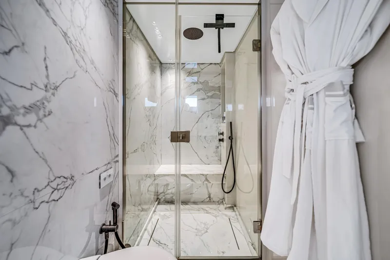 Slide: The Image of Luxurious marble bathroom with glass shower in 2020 Sanlorenzo SX88 yacht. - 93