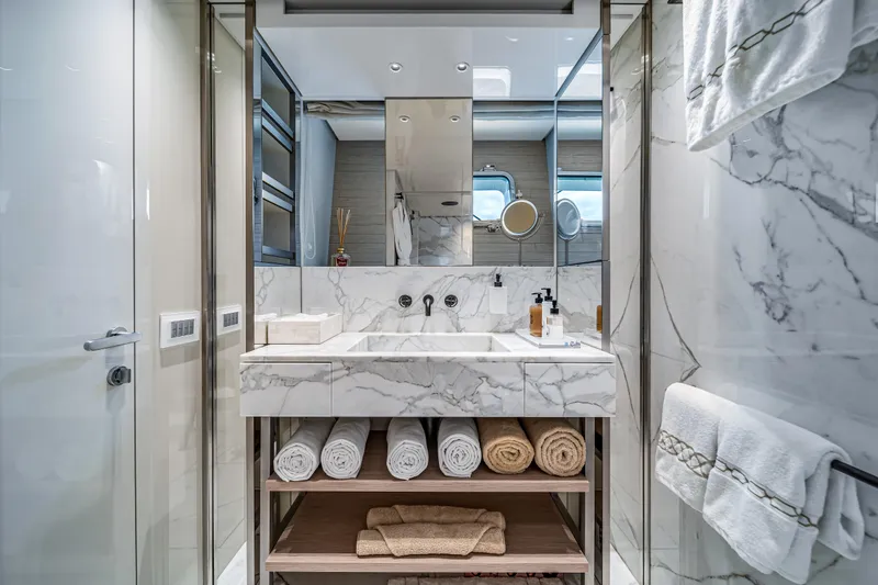 Slide: The Image of Luxurious marble bathroom on 2020 Sanlorenzo SX88 yacht with elegant fixtures and plush towels. - 95