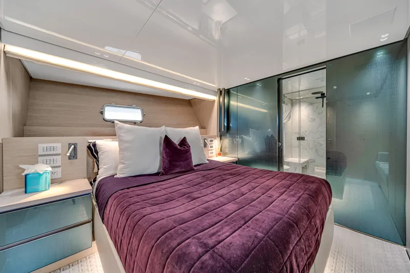 Slide: The Image of Luxurious Sanlorenzo SX88 2020 yacht bedroom with plush bedding and modern design. - 97
