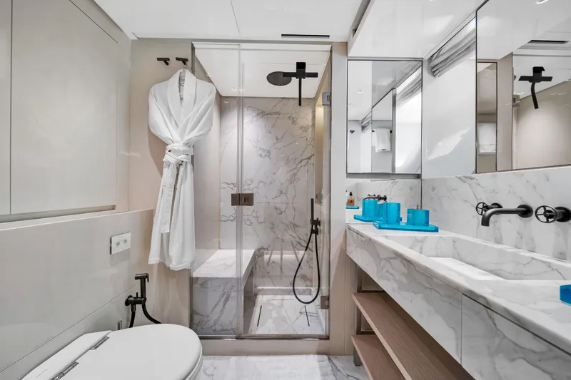 Slide: The Image of Luxurious bathroom in 2020 Sanlorenzo SX88 yacht with marble finishes and modern fixtures. - 98