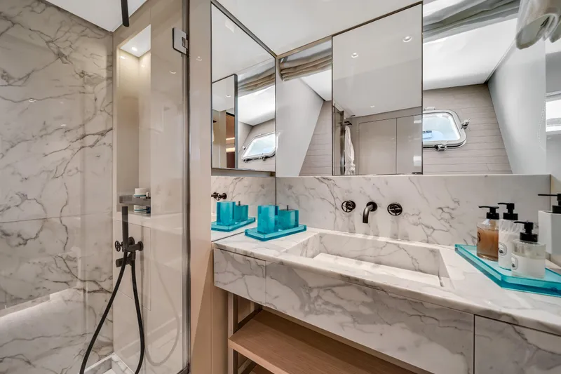 Slide: The Image of Luxurious marble bathroom in 2020 Sanlorenzo SX88 yacht with modern fixtures and elegant design. - 99