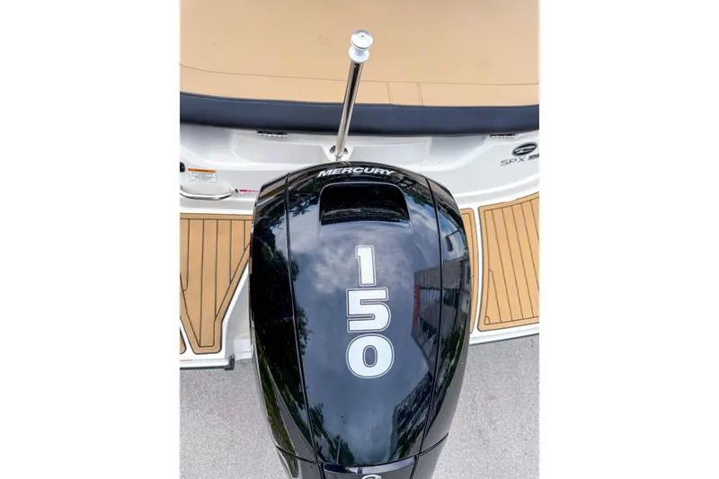 Slide: The Image of 2023 Sea Ray 19 SPX OB with Mercury 150 outboard engine, rear view. - 2