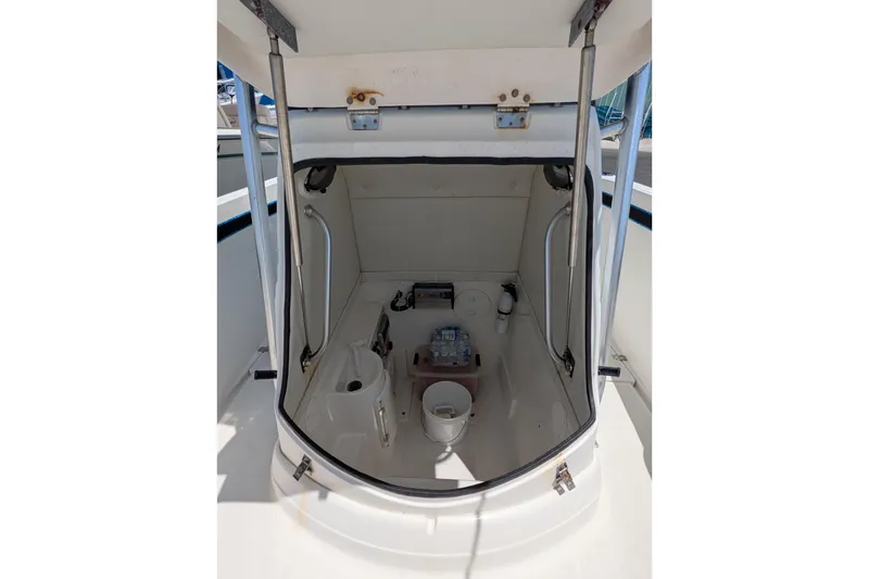 Slide: The Image of 2004 Wellcraft 29 CCF boat interior with storage and equipment. - 6