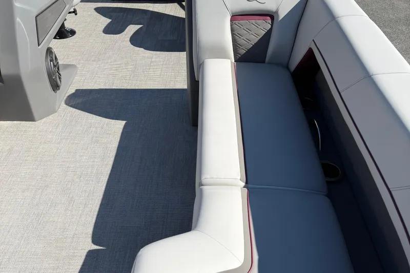 Slide: The Image of Luxurious seating on 2025 Qwest Splash Pad L-Class boat with modern design and premium materials. - 3