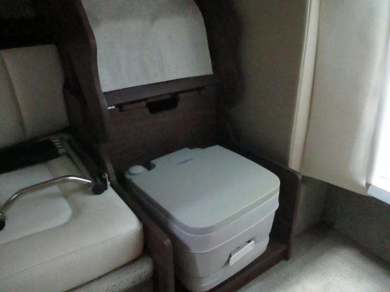 Slide: The Image of 2018 Rinker QX29 CC yacht certification plaque, NMMA certified, safety compliance details. - 12